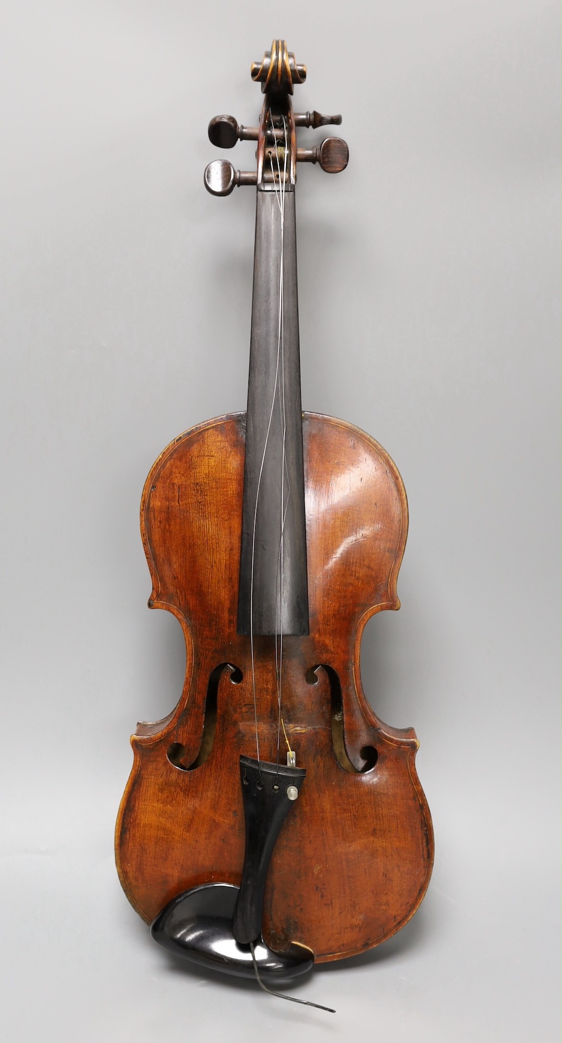 A violin labelled 'Albani Palermo', cased, length of back 35.5cm